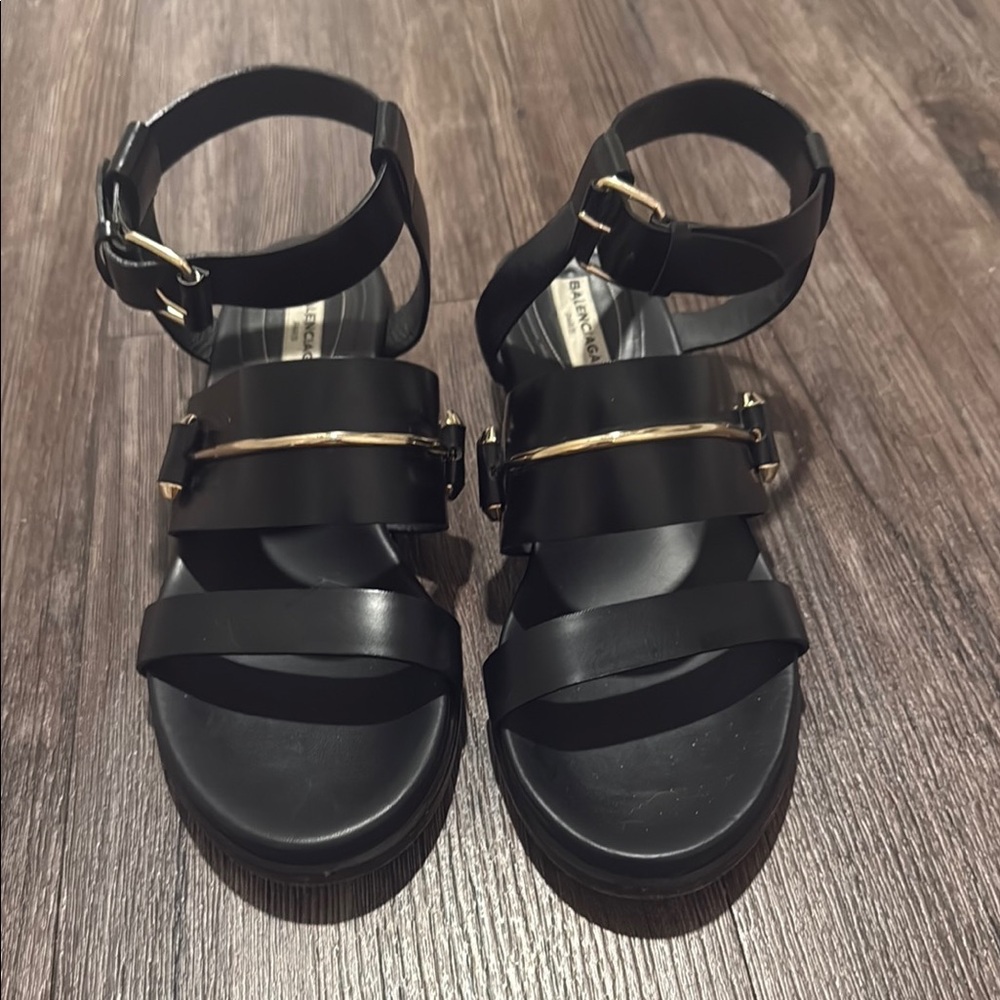 Balenciaga Stylish Black Sandals with Gold Accents, size 38